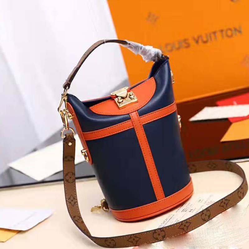 Duffle linen handbag Louis Vuitton Brown in Linen - 26550694