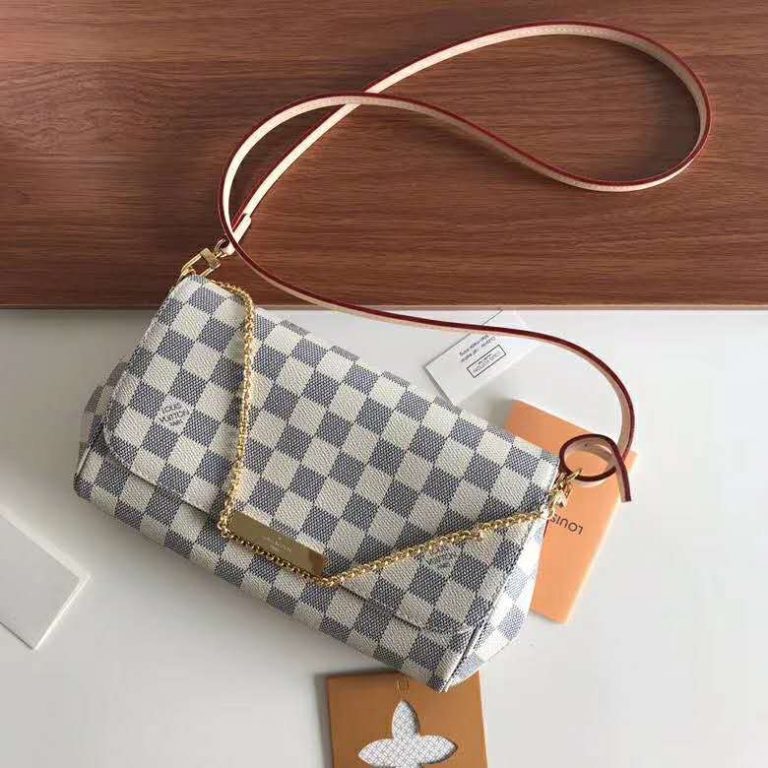 louis vuitton carrot clutch bag