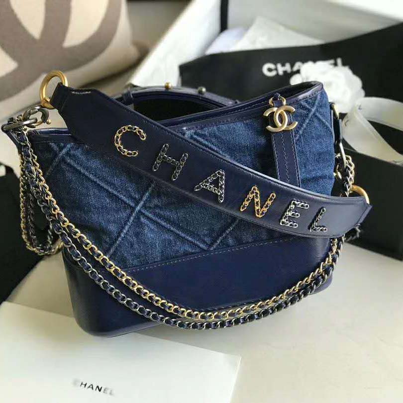 Chanel Gabrielle small size hobo bag in denim with gold and silver hardware  at 1stDibs