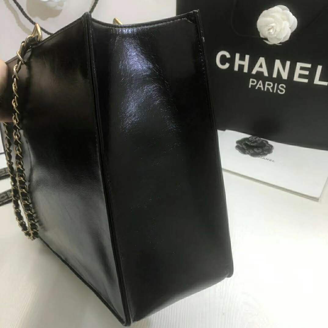 Mini shopping bag, Shiny aged calfskin & gold-tone metal, black — Fashion
