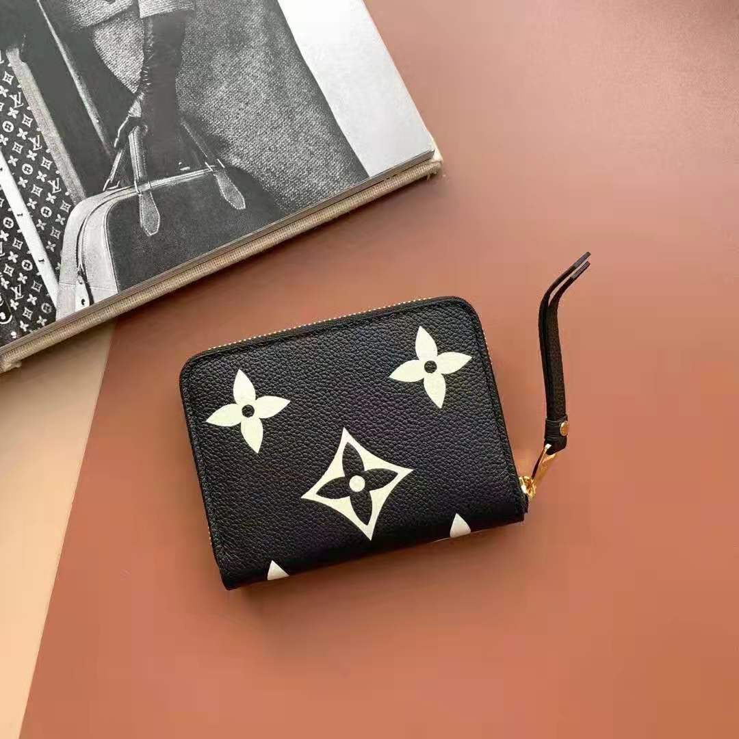 LOUIS VUITTON Monogram Embossed Zippy Wallet, Black – Past