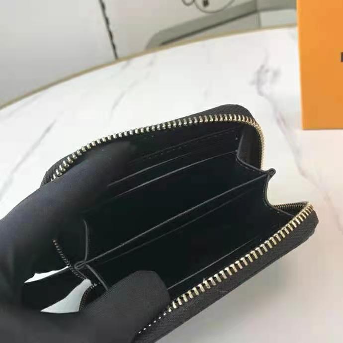 Louis Vuitton Black Monogram Game On Zippy Coin Purse Cloth ref.960723 -  Joli Closet