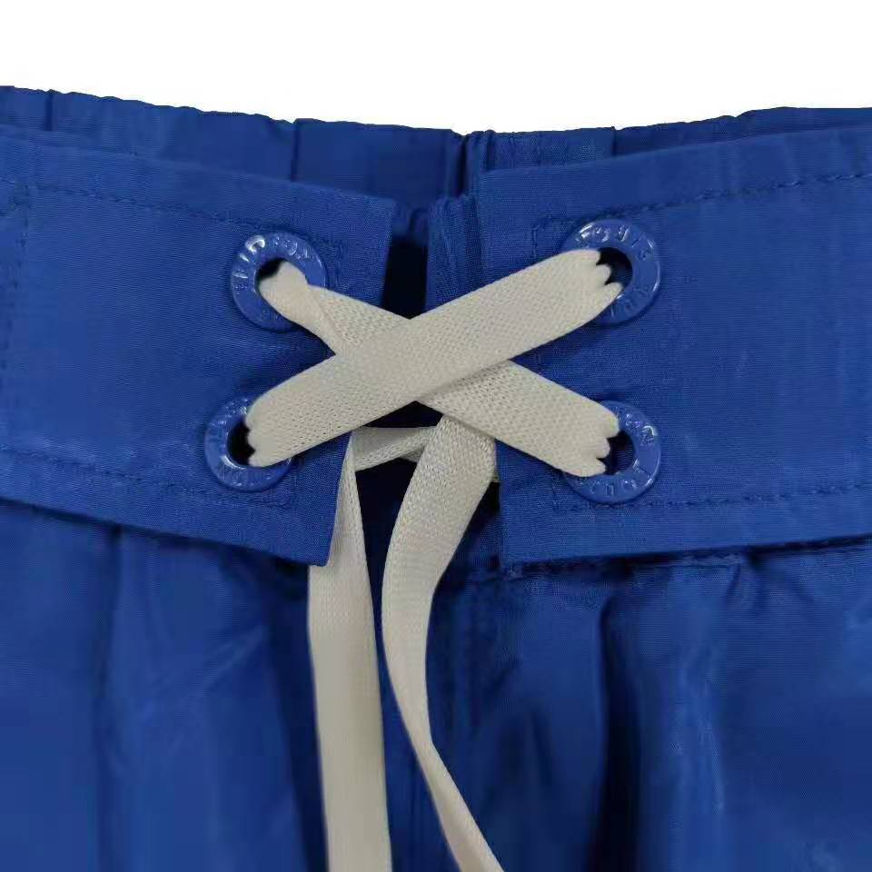 Louis Vuitton Staples Edition 3D Pocket Monogram Board Shorts Electric Blue. Size M0
