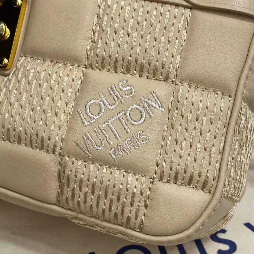 Louis Vuitton Beige Leather Quilted Pochette Troca Shoulder Bag – Shop Luxe  Society