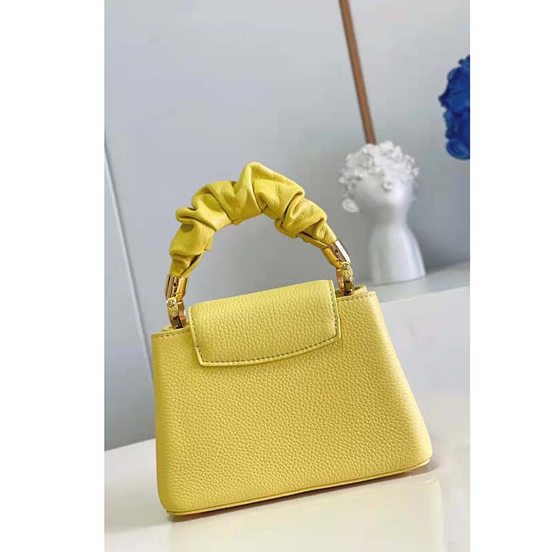 Capucines leather handbag Louis Vuitton Yellow in Leather - 33904823