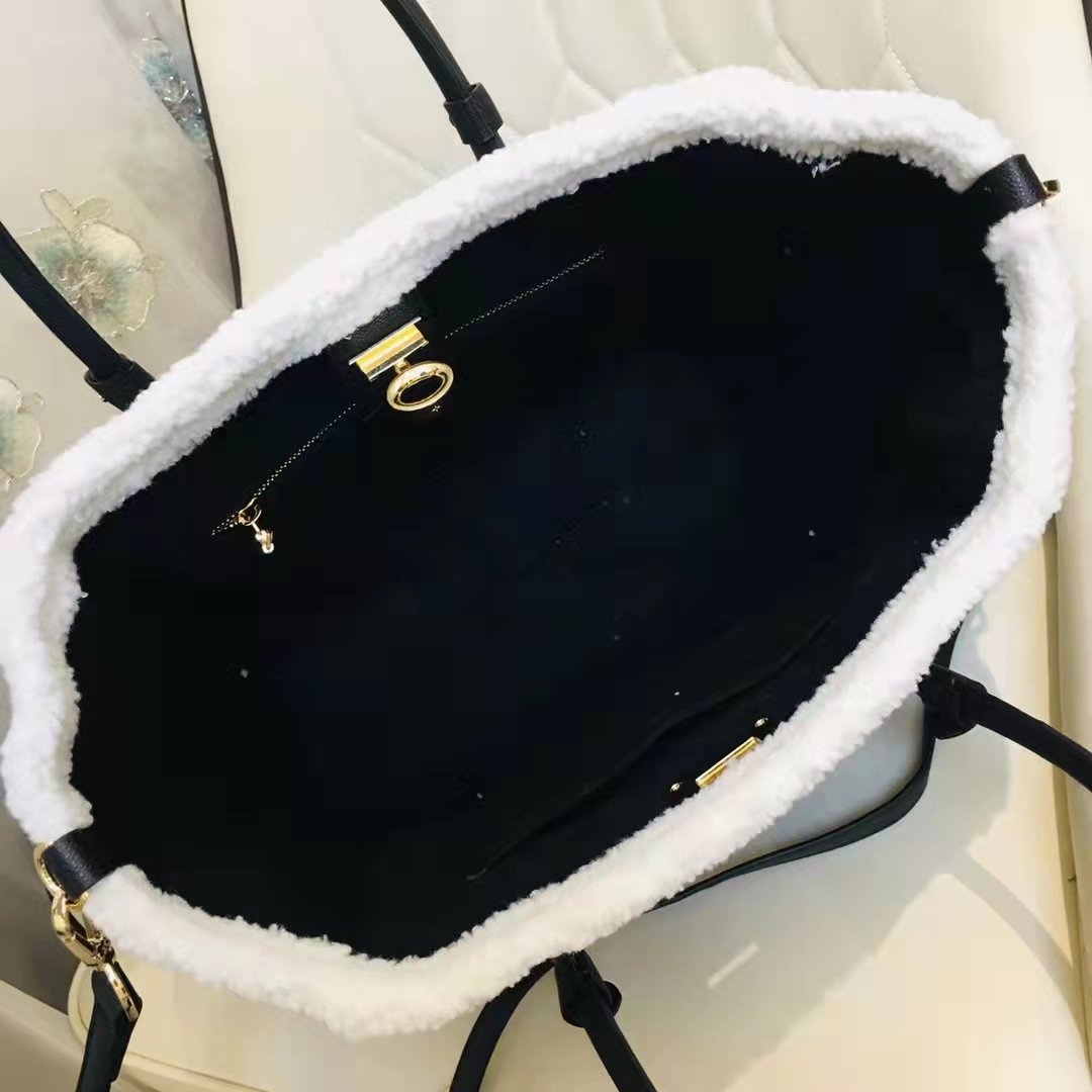 Louis Vuitton Black Grained Calfskin & White Shearling Monogram On My –  LuxuryPromise