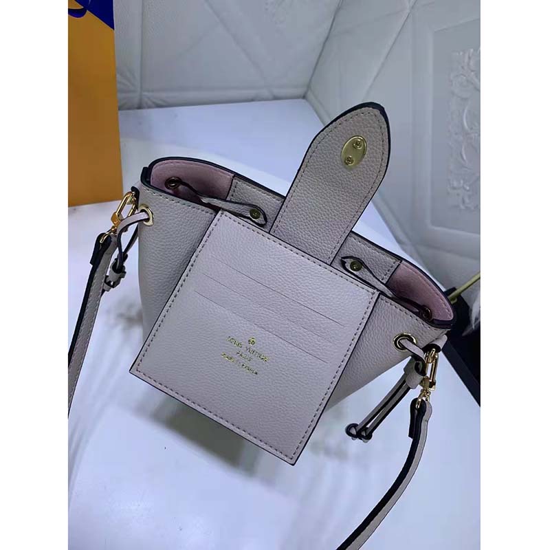 ✖️SOLD✖️ Louis Vuitton Greige Nano Lockme Bucket Bag $2,150.00 Microchipped  Material: Calfskin Hardware: Gold-tone Colour: Greige Size:…