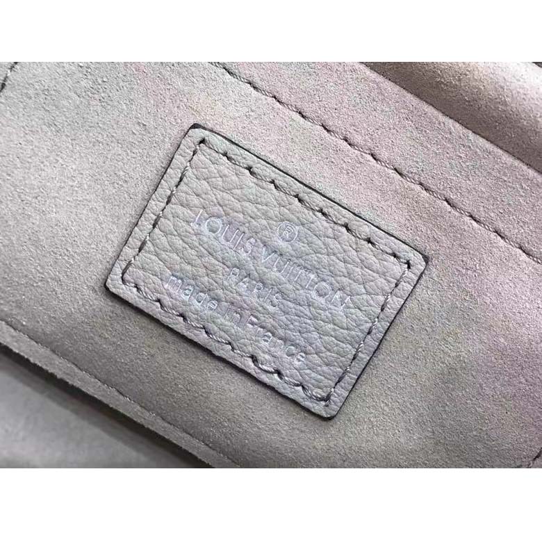 Scala Mini Pouch — made of the supple perforated leather inspired