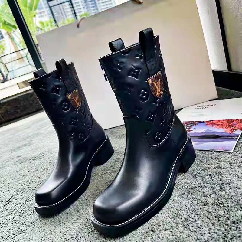 LOUIS VUITTON Ankle boots T.EU 37 leather Black ref.998440 - Joli