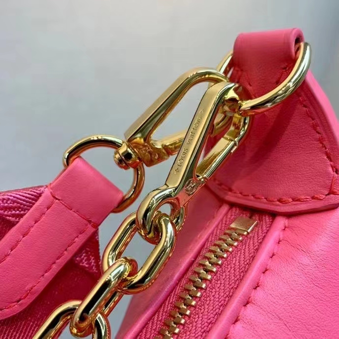 LOUIS VUITTON 25 cm bag in smooth leather and pink spik…
