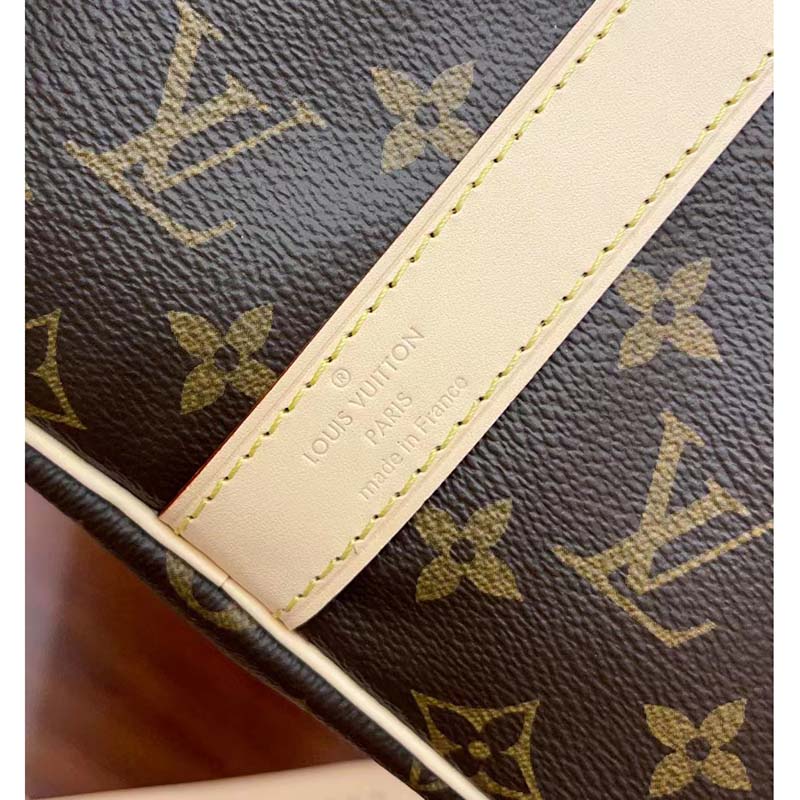 This Keepall Bandoulière 45 is fashioned from Monogram coated canvas and  cowhide leather, as part of the LV Portrait capsule collection.…