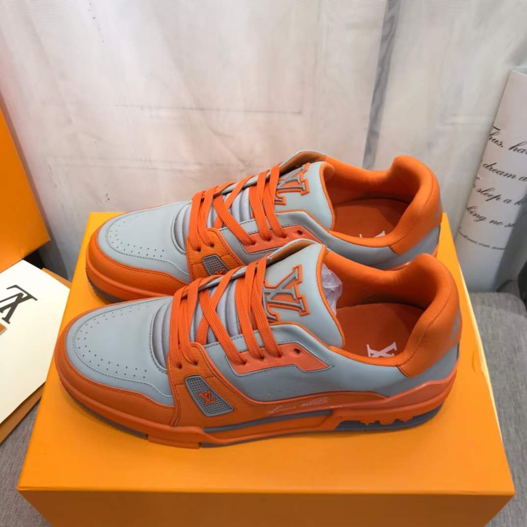 Lv trainer leather low trainers Louis Vuitton Orange size 8.5 UK in Leather  - 28229032
