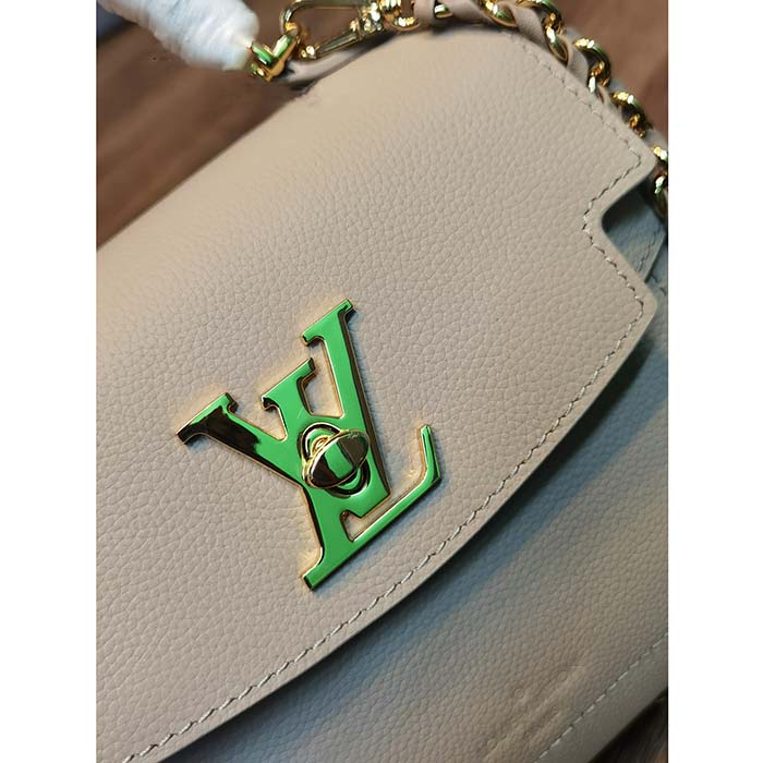 The highly coveted newest addition to the lockme line. This one is the ever  mini size in greige. Yay or nay? : r/Louisvuitton