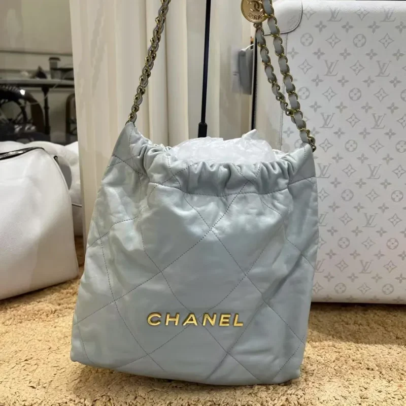 Chanel Women CC Small 22 Handbag Shiny Calfskin & Gold-Tone Metal-Light Blue